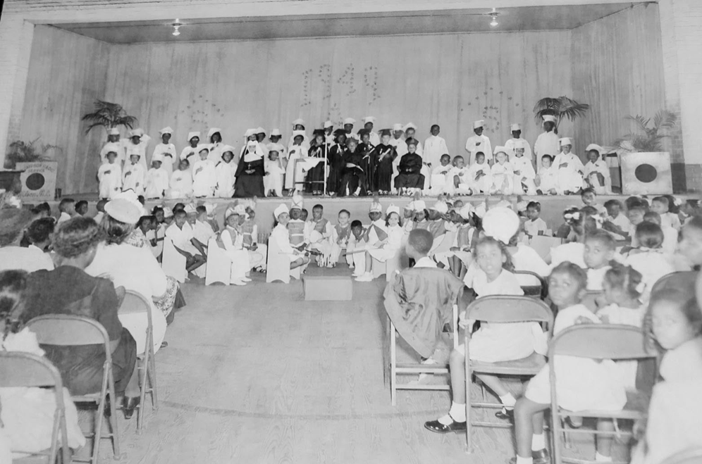 Saint Alphonsus graduates. Black WideAwake